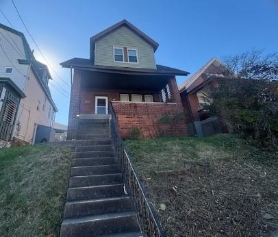 2992 Ruthwood Avenue Pittsburgh, PA 15227 - Photo 1 of 11 a view of a house with a yard and stairs