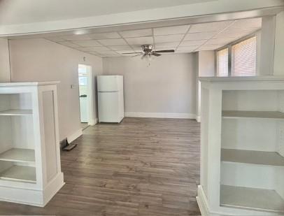 2992 Ruthwood Avenue Pittsburgh, PA 15227 - Photo 6 of 11 a view of a room with wooden floor and staircase