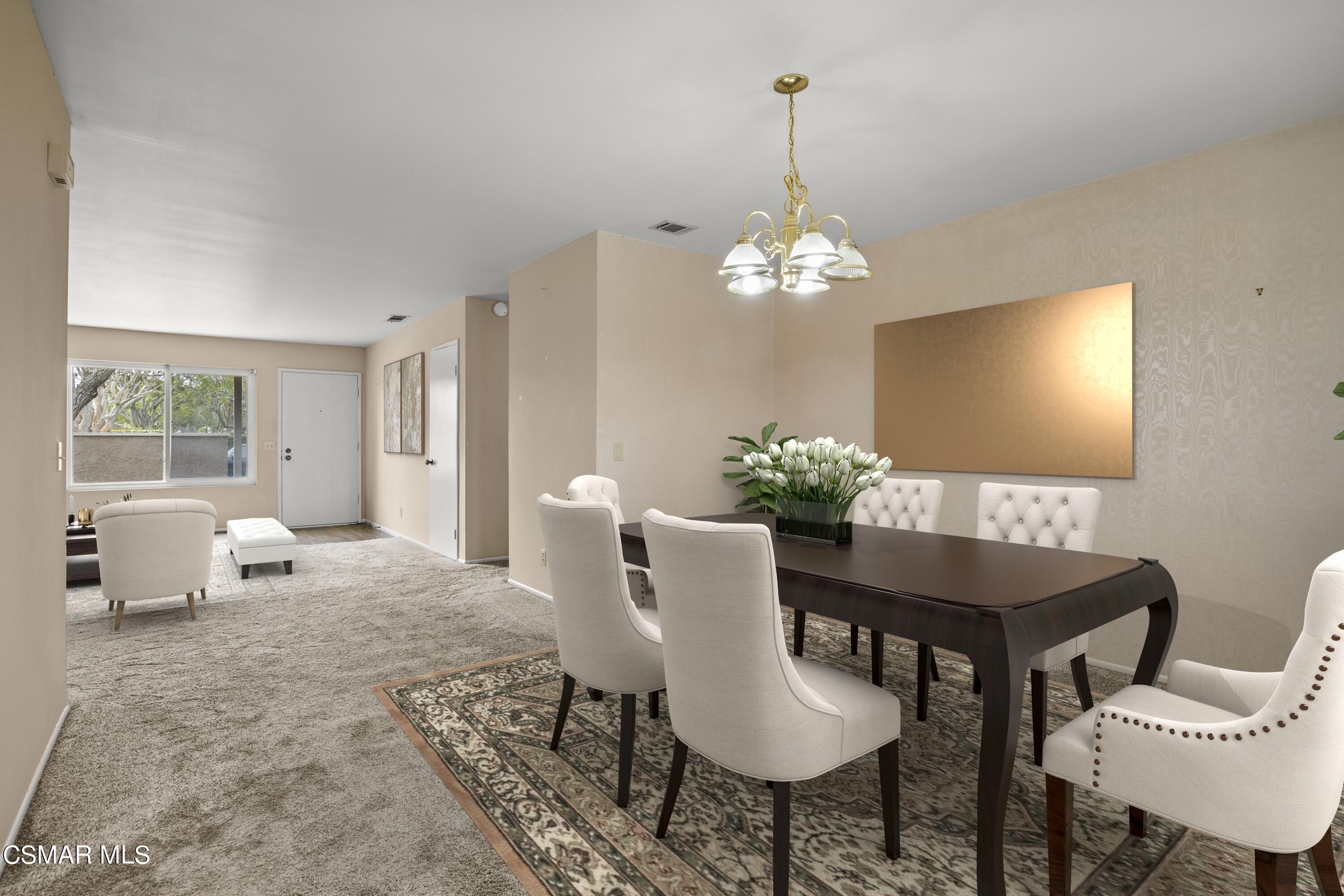 3601 Ketch Avenue Oxnard, CA 93035 - Photo 11 of 37 a view of a dining room with furniture and chandelier