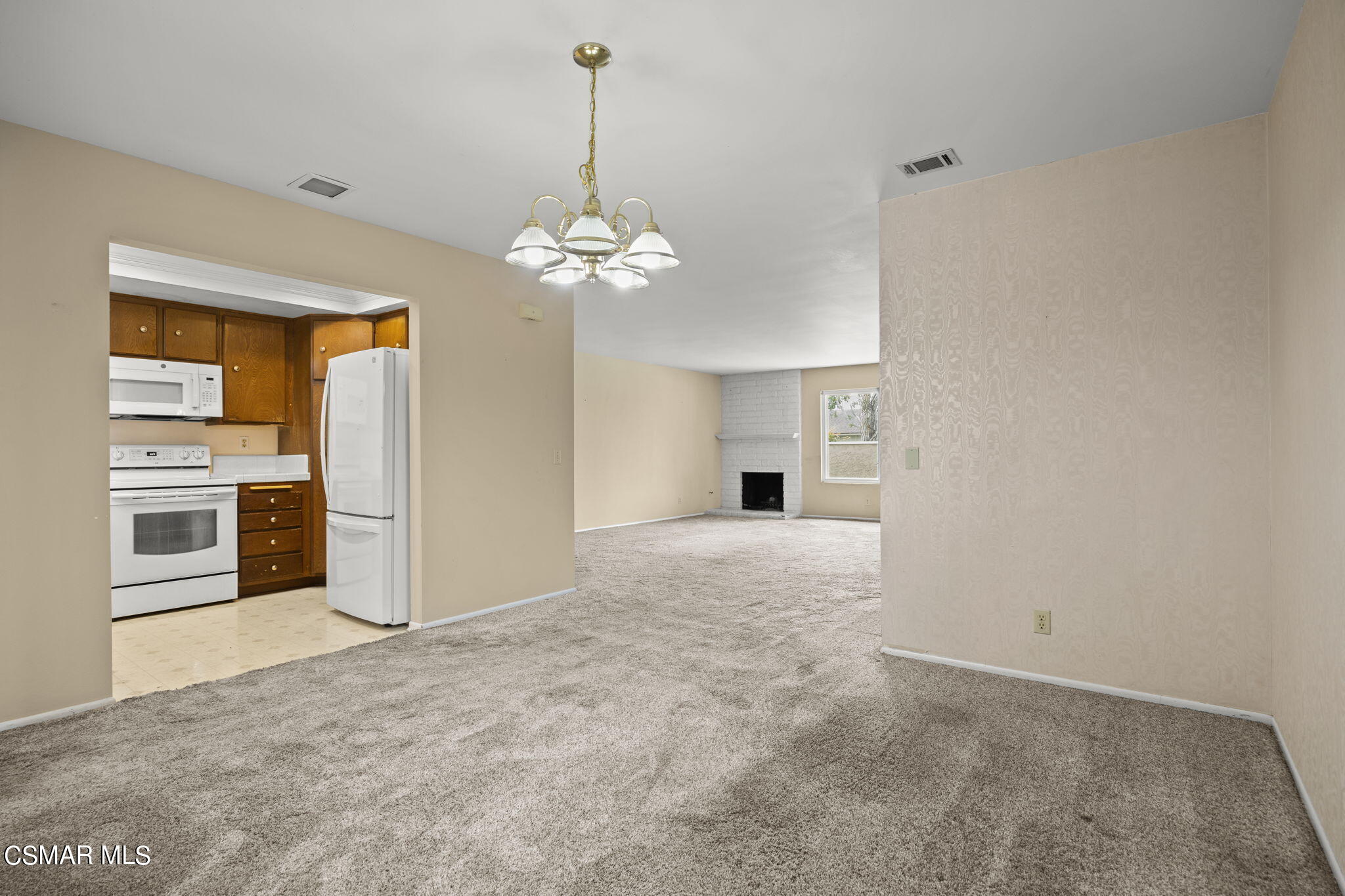 3601 Ketch Avenue Oxnard, CA 93035 - Photo 13 of 37 a view of a kitchen with a sink and dishwasher kitchen view