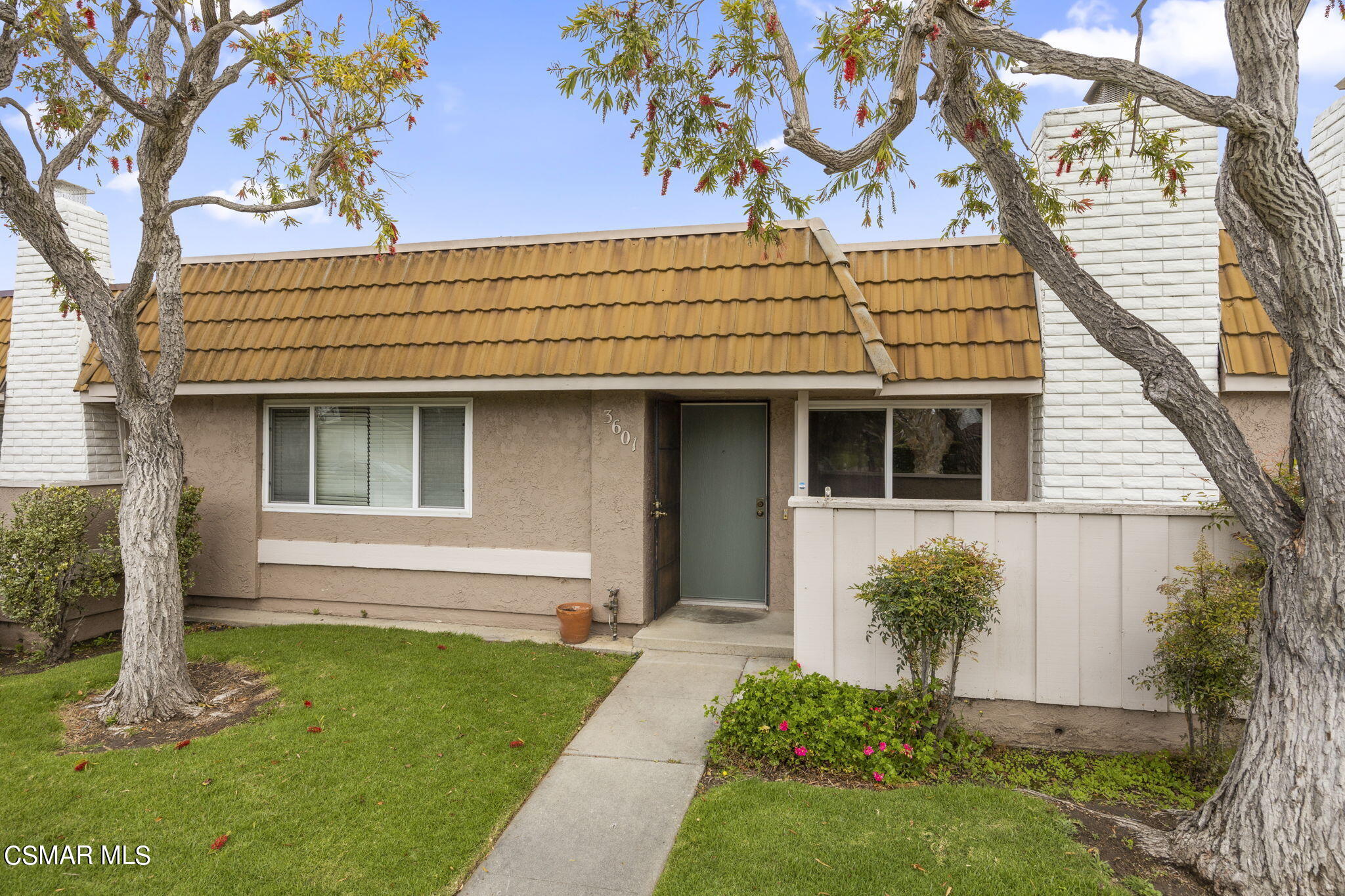 3601 Ketch Avenue Oxnard, CA 93035 - Photo 3 of 37 a front view of a house with garden