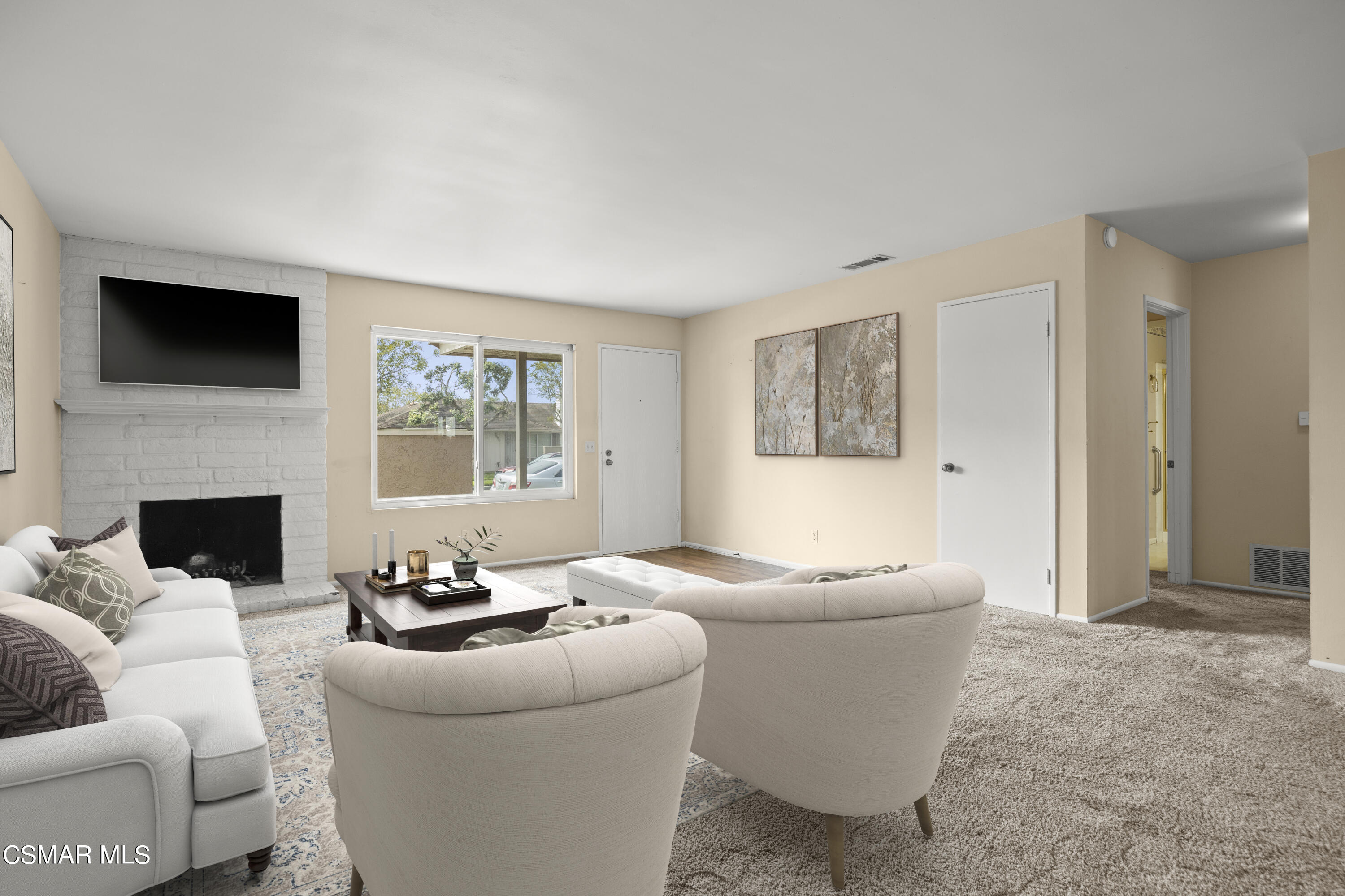 3601 Ketch Avenue Oxnard, CA 93035 - Photo 6 of 37 a living room with furniture and a fireplace