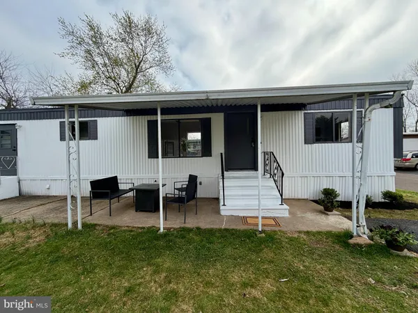 front view of a house with a patio
