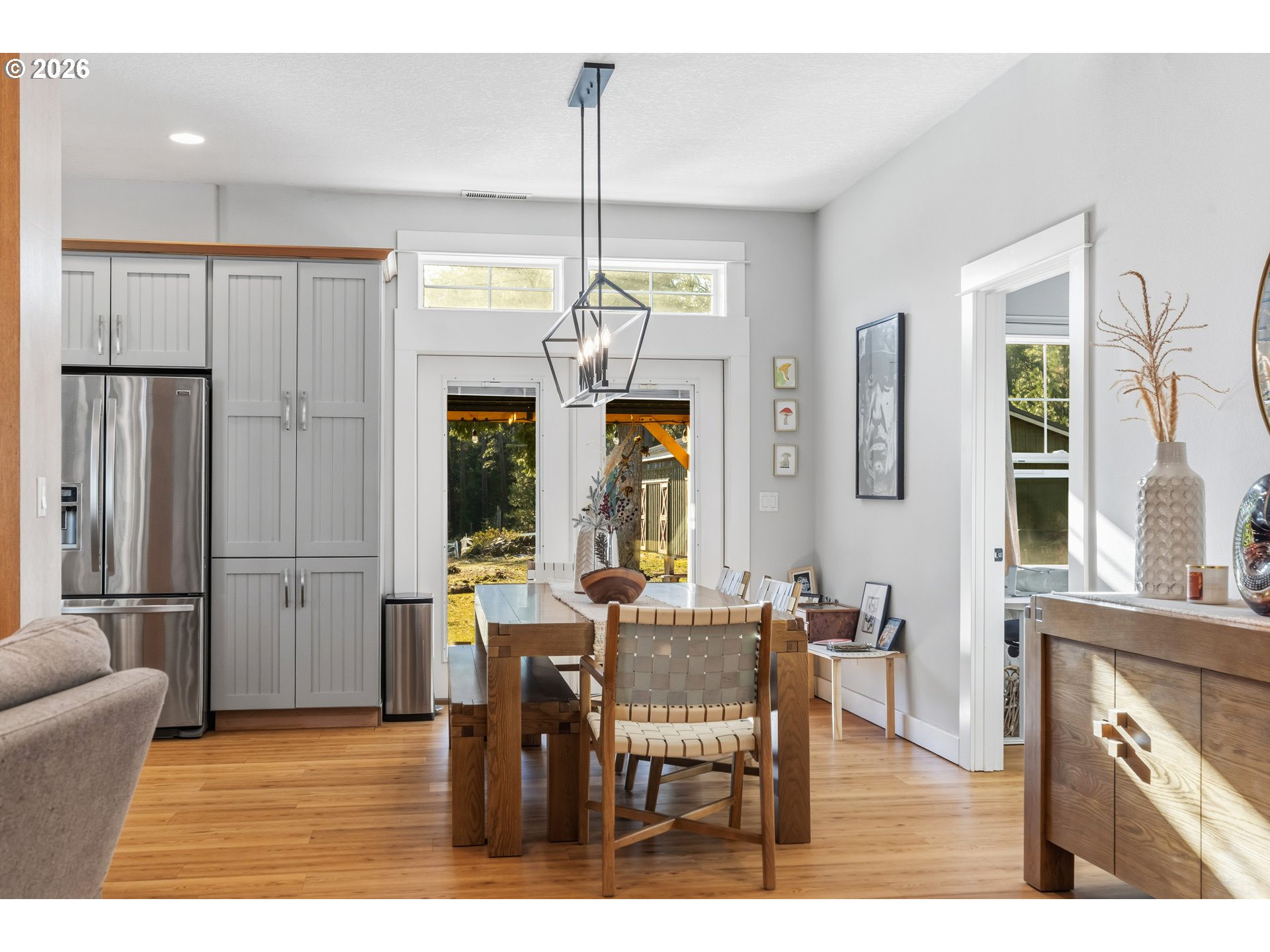 4 Westside Road Trout Lake, WA 98650 - Photo 15 of 45 a view of a dining room with furniture window and wooden floor