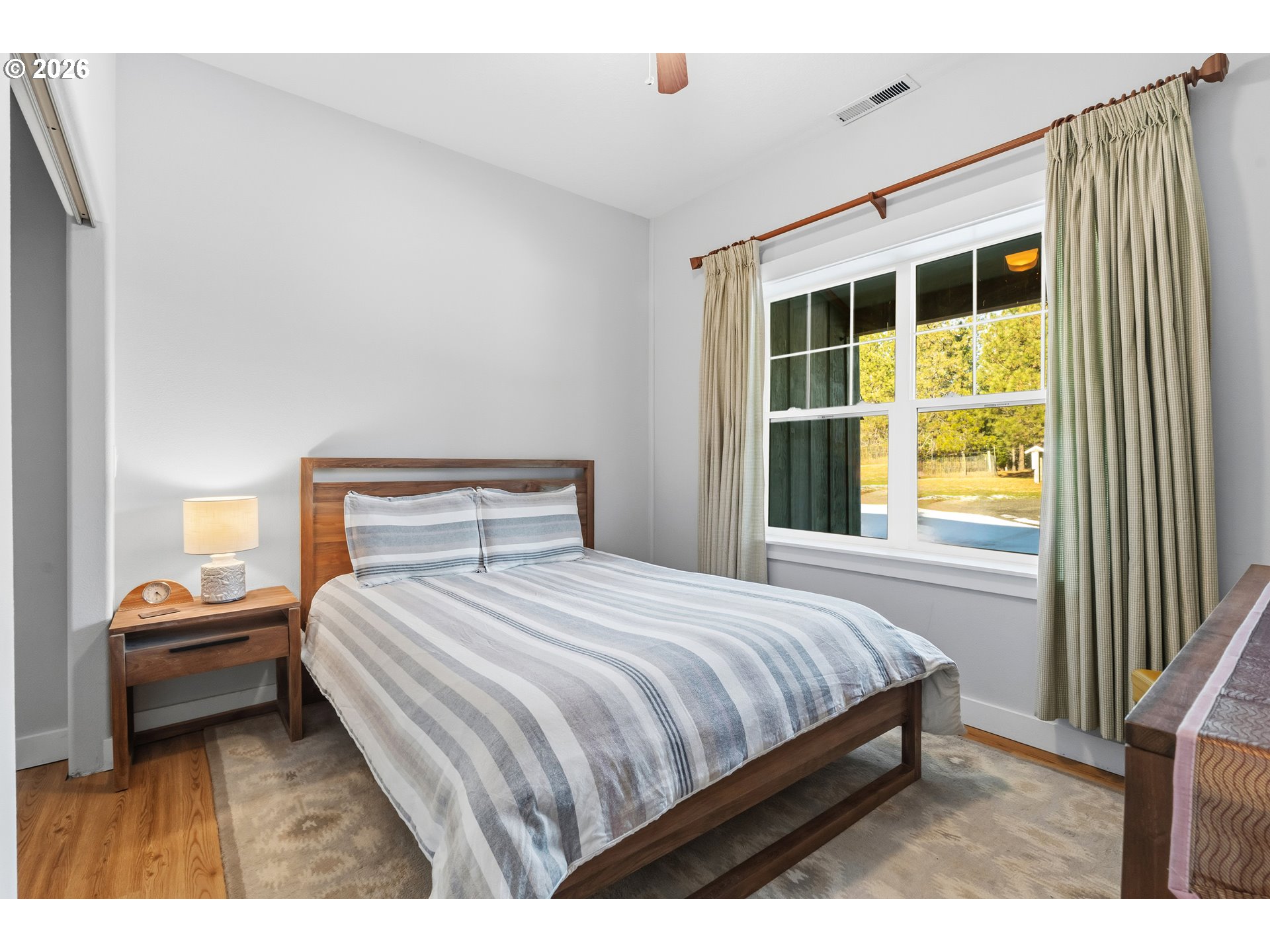 4 Westside Road Trout Lake, WA 98650 - Photo 17 of 45 a bedroom with a bed and a window