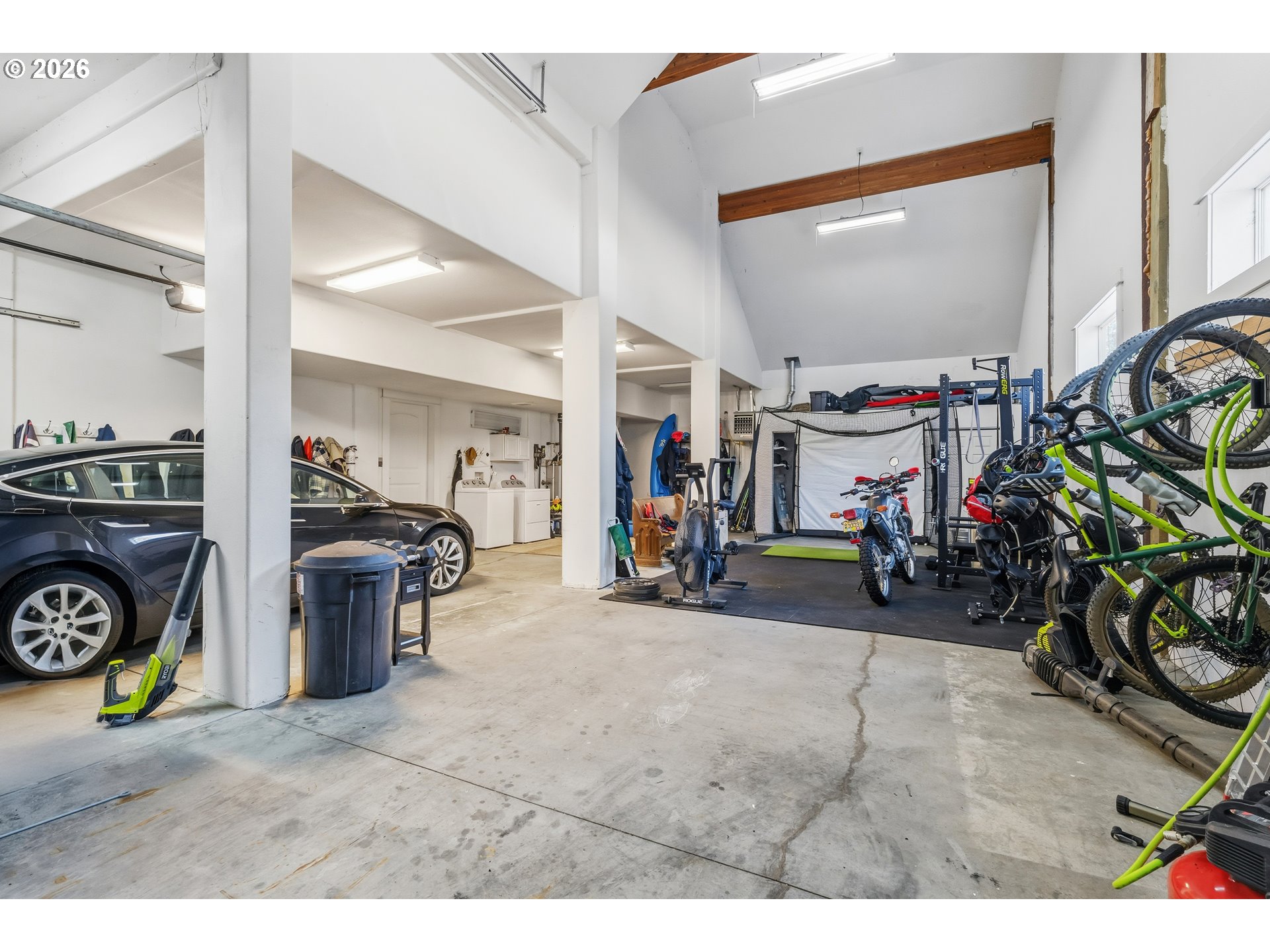 4 Westside Road Trout Lake, WA 98650 - Photo 27 of 45 a view of a garage with a bike and a window