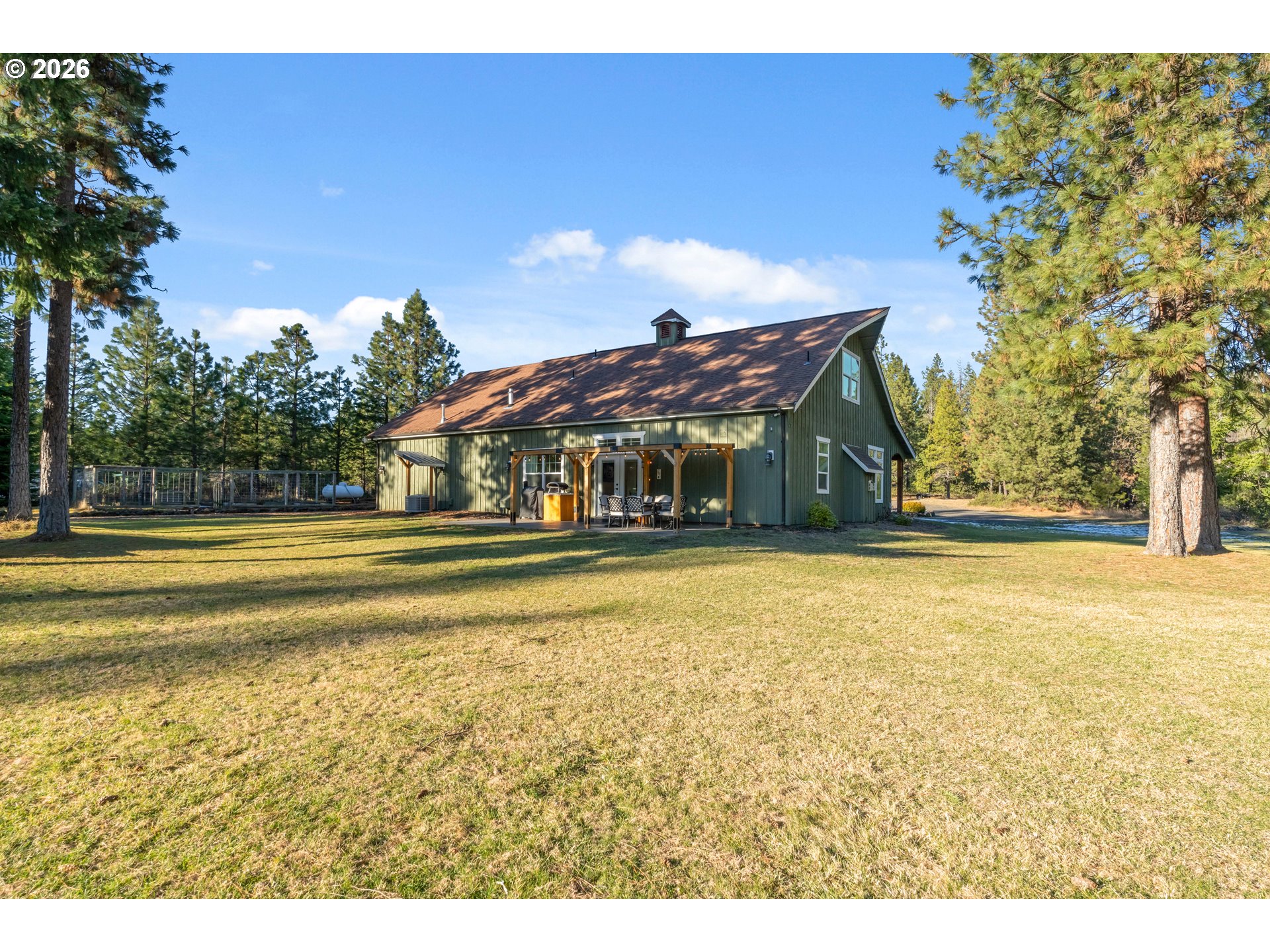 4 Westside Road Trout Lake, WA 98650 - Photo 29 of 45 a view of a house with a swimming pool