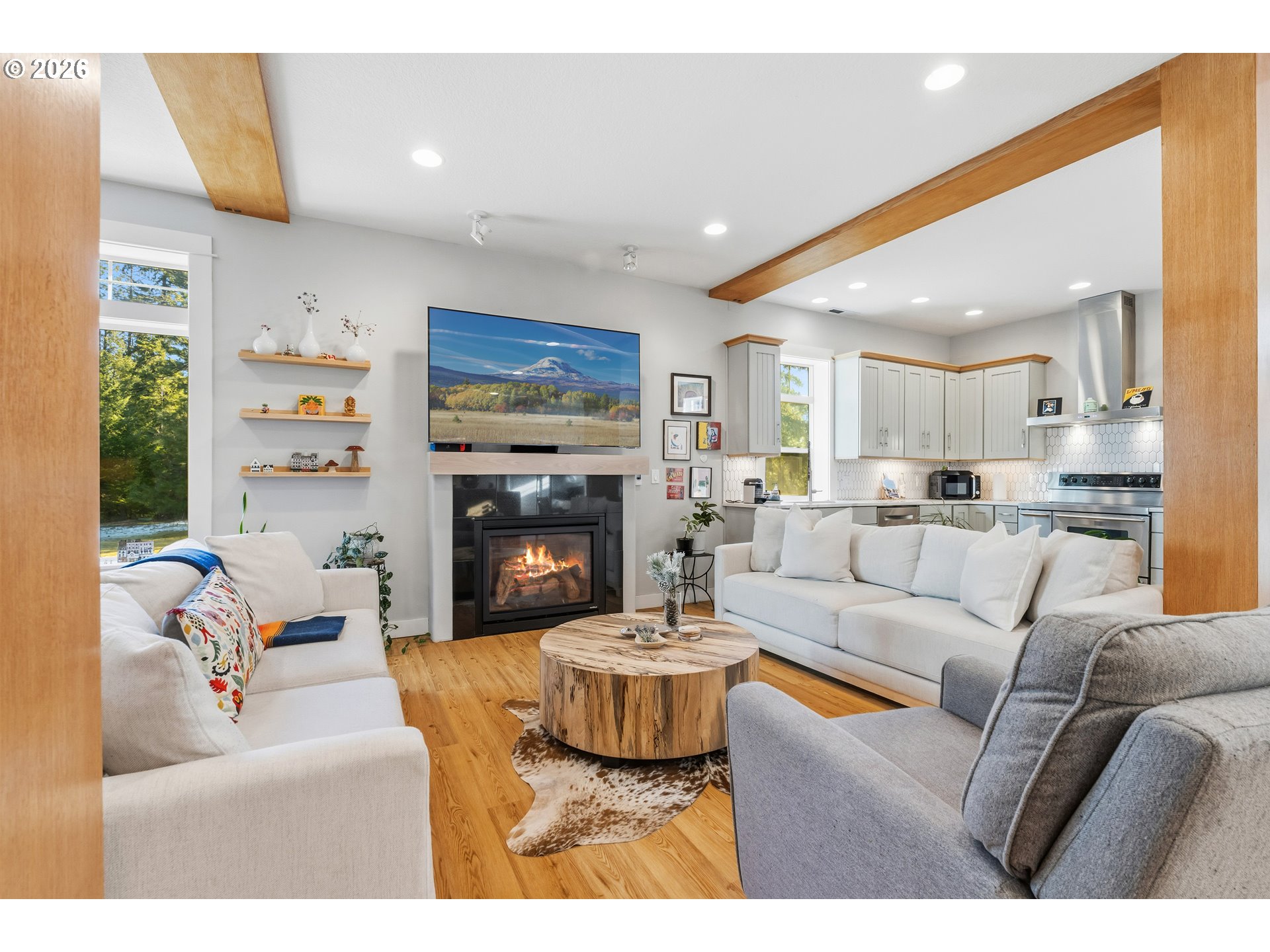 4 Westside Road Trout Lake, WA 98650 - Photo 5 of 45 a living room with furniture and a fireplace