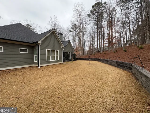 a front view of a house with glass windows