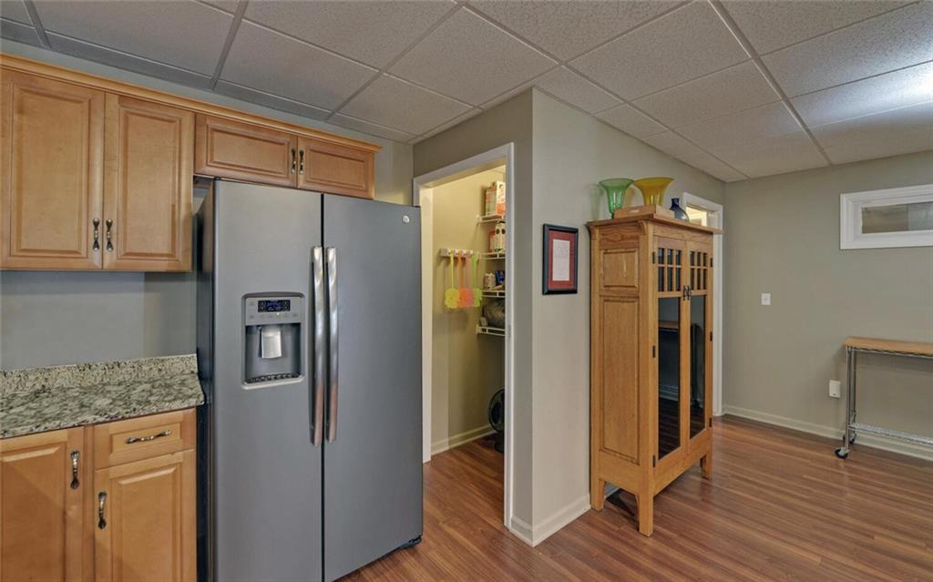 3644 Maple Forge Lane Gainesville, GA 30504 - Photo 24 of 49 a kitchen with stainless steel appliances granite countertop a refrigerator and a sink