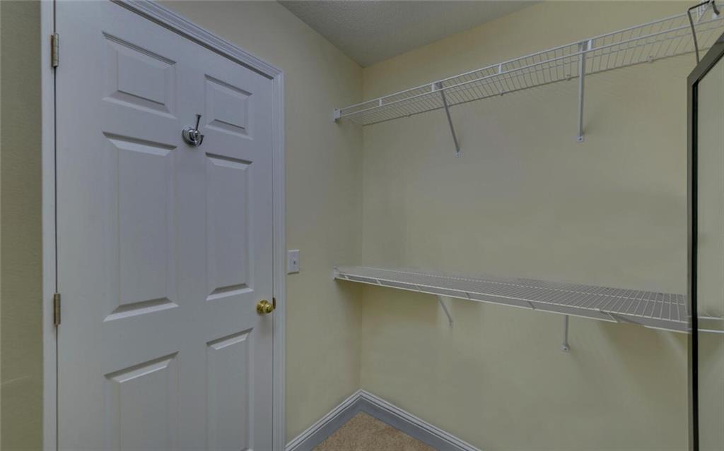 3644 Maple Forge Lane Gainesville, GA 30504 - Photo 46 of 49 a view of a room with racks on the wall