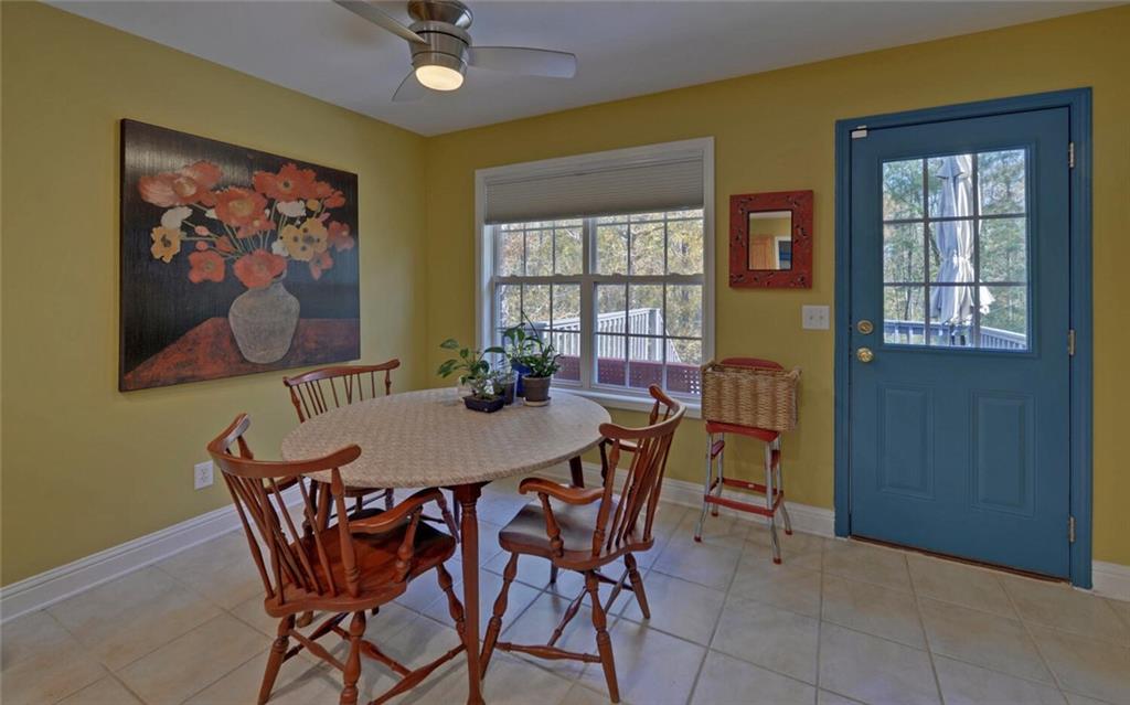 3644 Maple Forge Lane Gainesville, GA 30504 - Photo 10 of 49 a view of a dining room with furniture and window