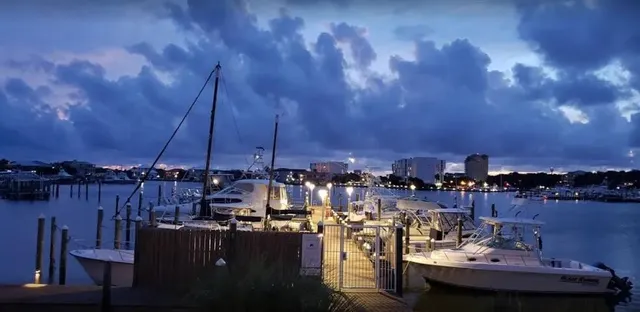 a view of a lake and outdoor seating