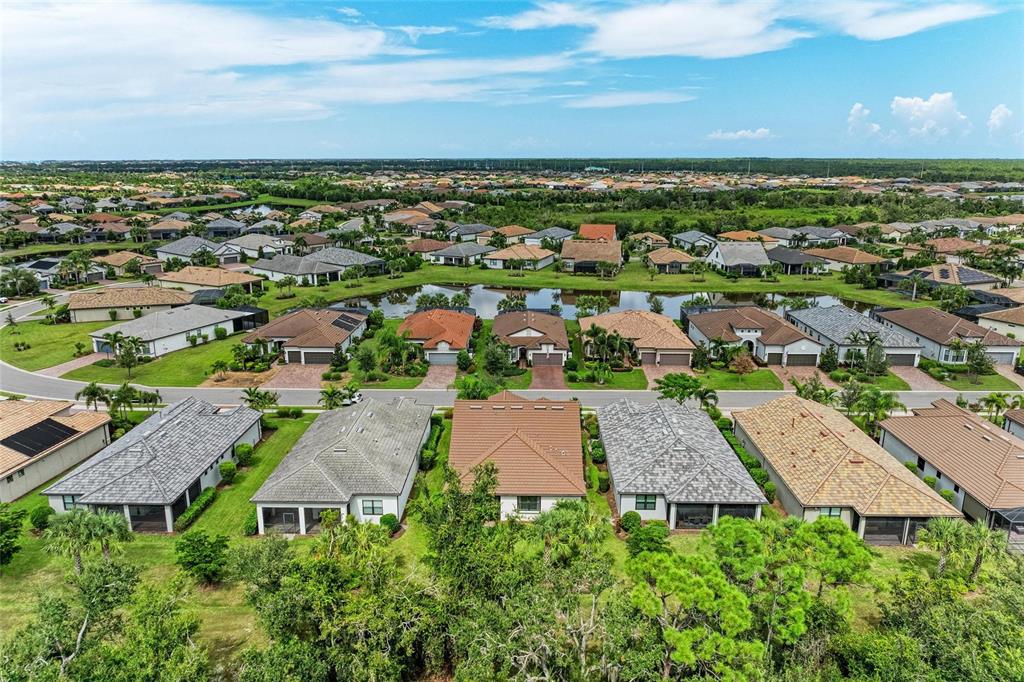 7572 Viola Loop Bradenton, FL 34202 - Photo 4 of 65 an aerial view of multiple house