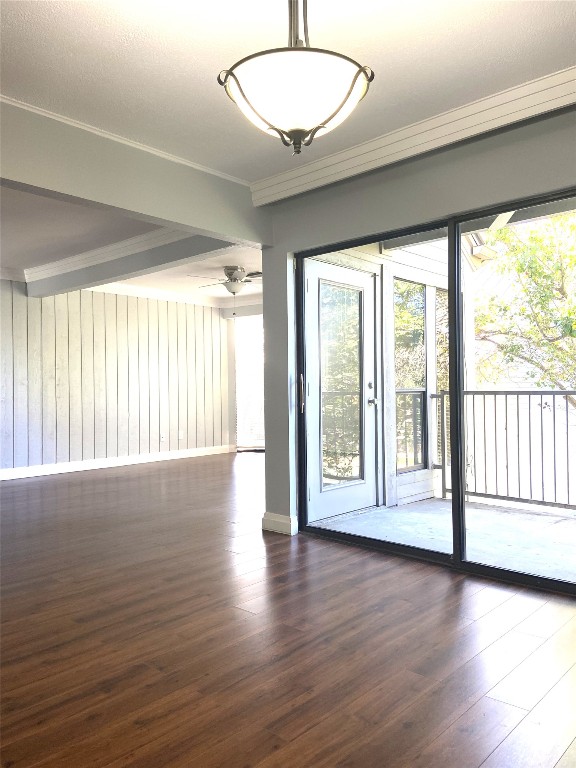 108 World Of Tennis Square, Unit 108C Lakeway, TX 78738 - Photo 11 of 25 a view of an empty room with wooden floor and a window