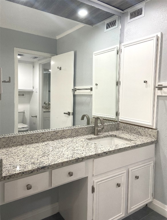 108 World Of Tennis Square, Unit 108C Lakeway, TX 78738 - Photo 17 of 25 a bathroom with a granite countertop sink and a mirror