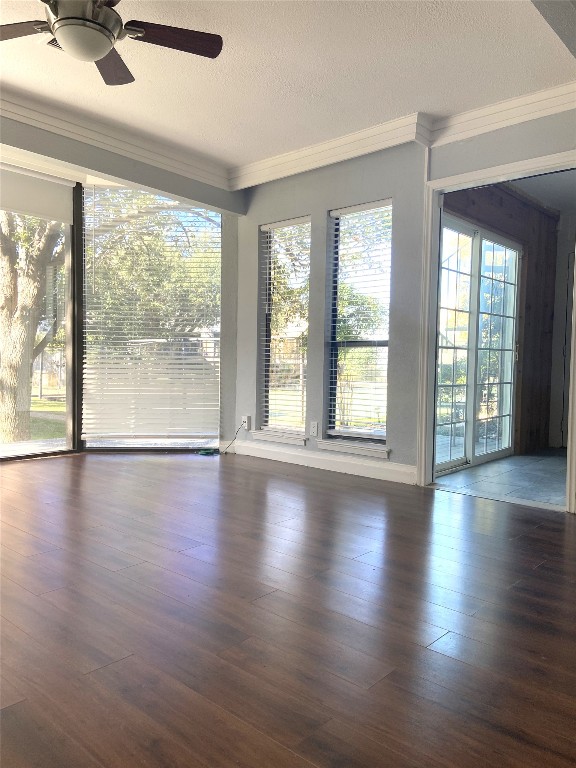 108 World Of Tennis Square, Unit 108C Lakeway, TX 78738 - Photo 20 of 25 a view of an empty room with wooden floor and a window