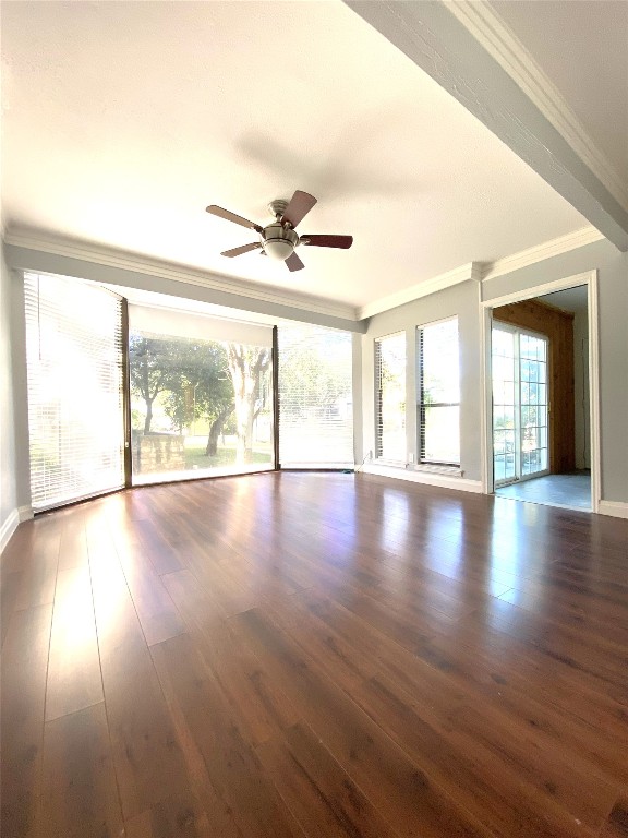 108 World Of Tennis Square, Unit 108C Lakeway, TX 78738 - Photo 22 of 25 a view of an empty room with wooden floor and a window