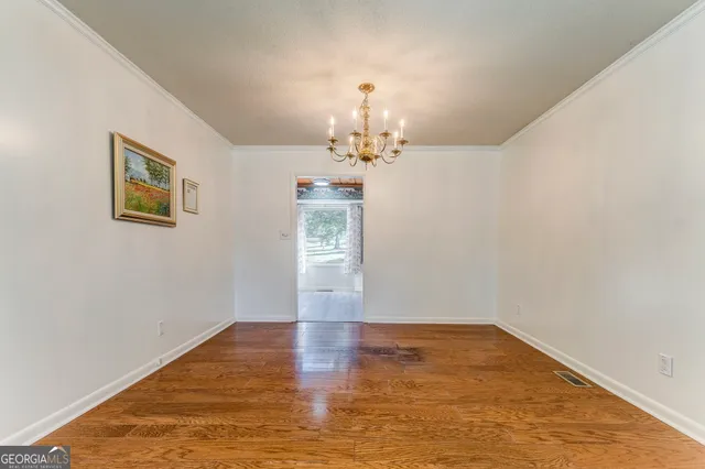 a kitchen with stainless steel appliances granite countertop a sink and a cabinets