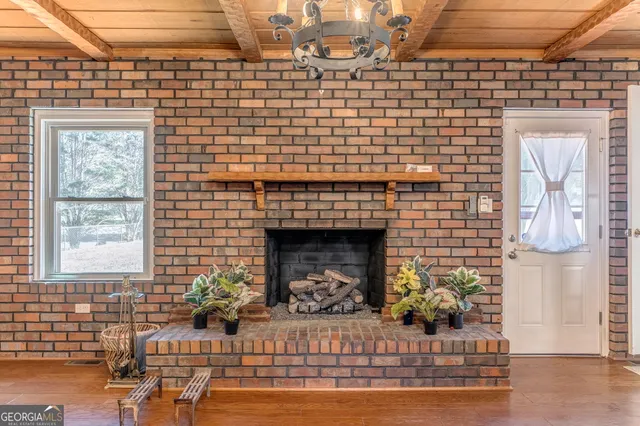 a view of empty room with windows