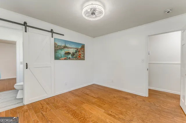 a view of a swimming pool with an outdoor seating and a yard