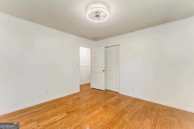 a view of yard with swimming pool and trees