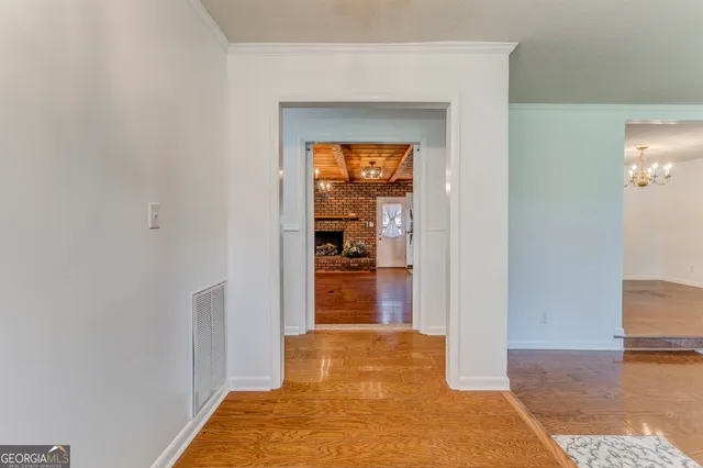 a view of a livingroom with wooden floor