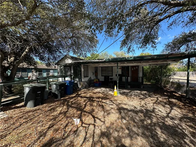 a view of a house with a patio