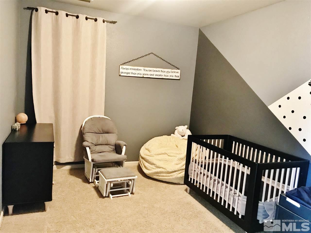 260 Brenham Avenue Reno, NV 89509 - Photo 13 of 20 a bedroom with bed and a window