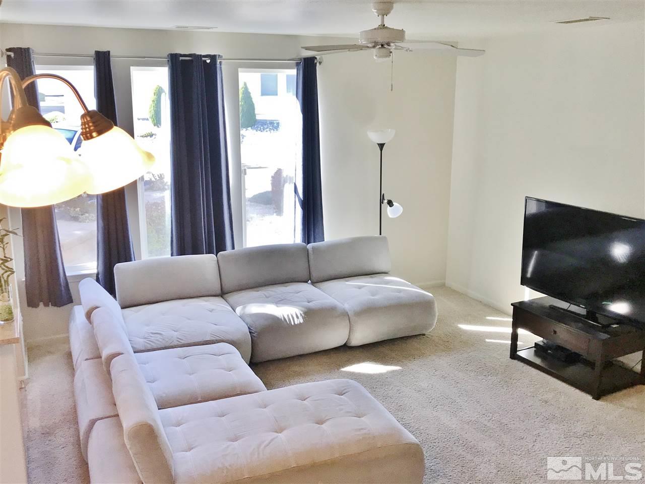 260 Brenham Avenue Reno, NV 89509 - Photo 20 of 20 a living room with furniture and a flat screen tv