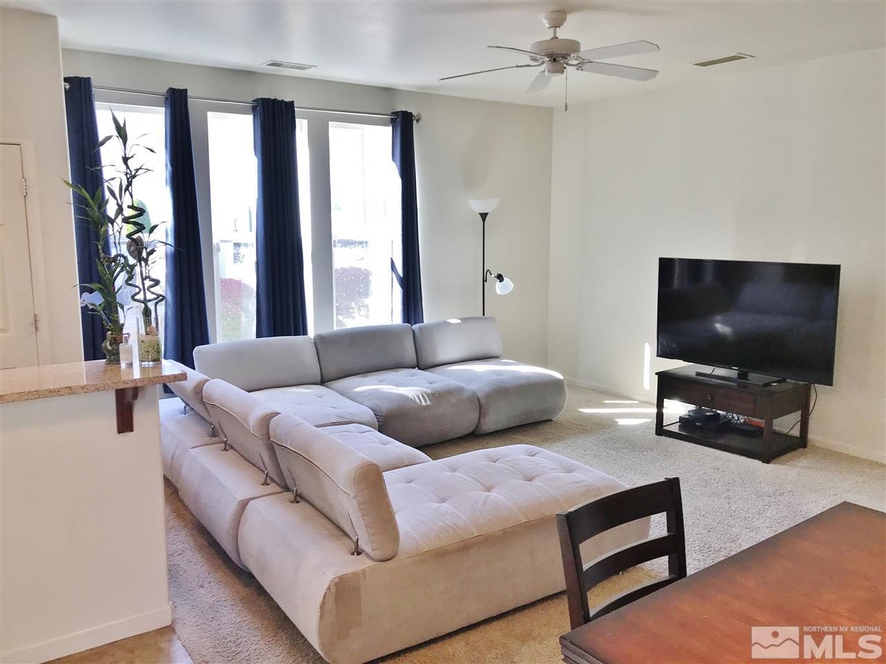 260 Brenham Avenue Reno, NV 89509 - Photo 6 of 20 a living room with furniture and a flat screen tv