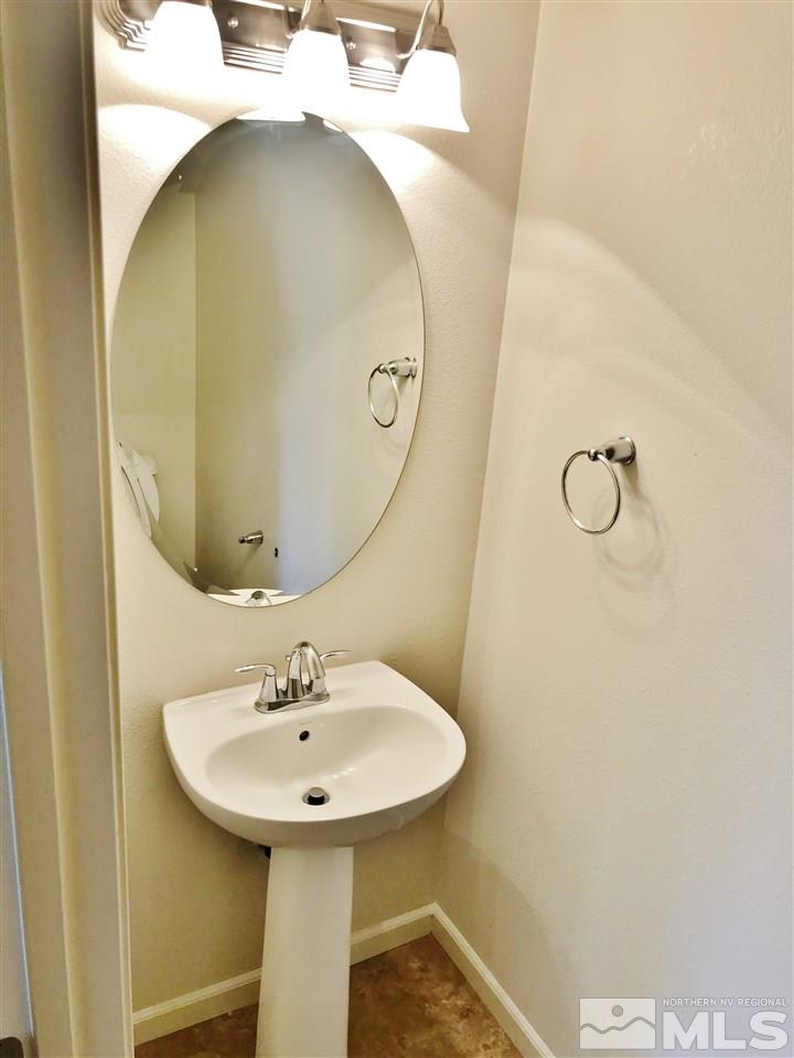 260 Brenham Avenue Reno, NV 89509 - Photo 8 of 20 a bathroom with a sink and mirror