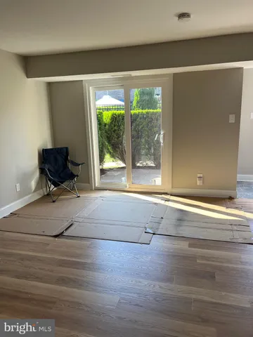 a kitchen with stainless steel appliances a stove microwave and sink