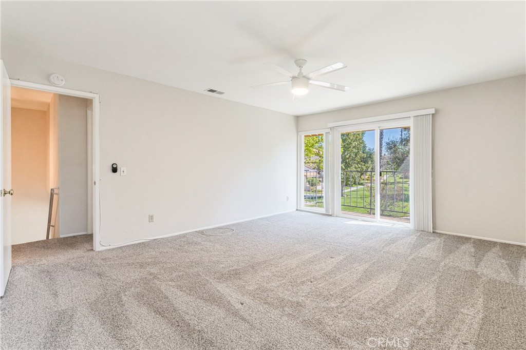 7088 Seville Way Riverside, CA 92506 - Photo 45 of 75 a view of an empty room with a window