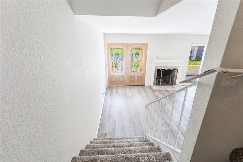 7088 Seville Way Riverside, CA 92506 - Photo 52 of 75 a view of entryway with wooden floor