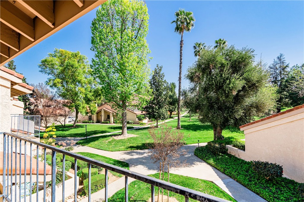 7088 Seville Way Riverside, CA 92506 - Photo 53 of 75 a view of a backyard with table and chairs and potted plants