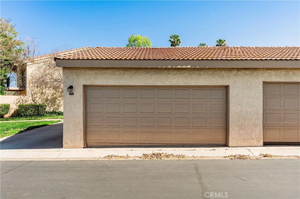 7088 Seville Way Riverside, CA 92506 - Photo 68 of 75 a view of a house with a parking area