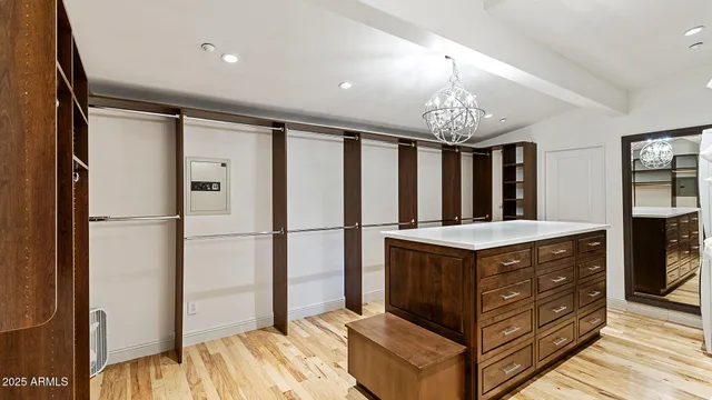 a kitchen with stainless steel appliances granite countertop a refrigerator a stove and a refrigerator