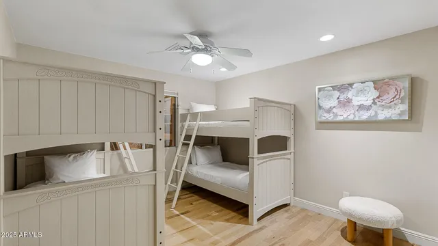 a kitchen with stainless steel appliances a refrigerator and a stove top oven