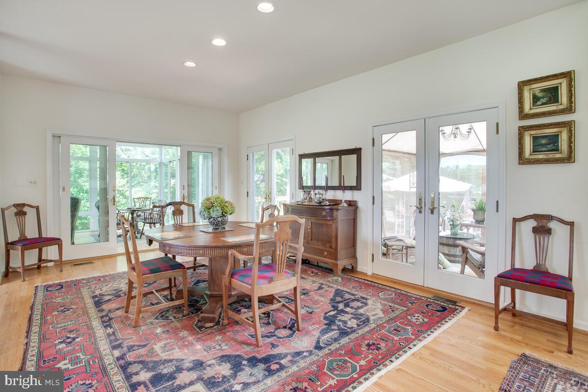 5025 Kings Road St. Leonard, MD 20685 - Photo 14 of 62 Spacious Dining area with doors to deck and Sun Rm