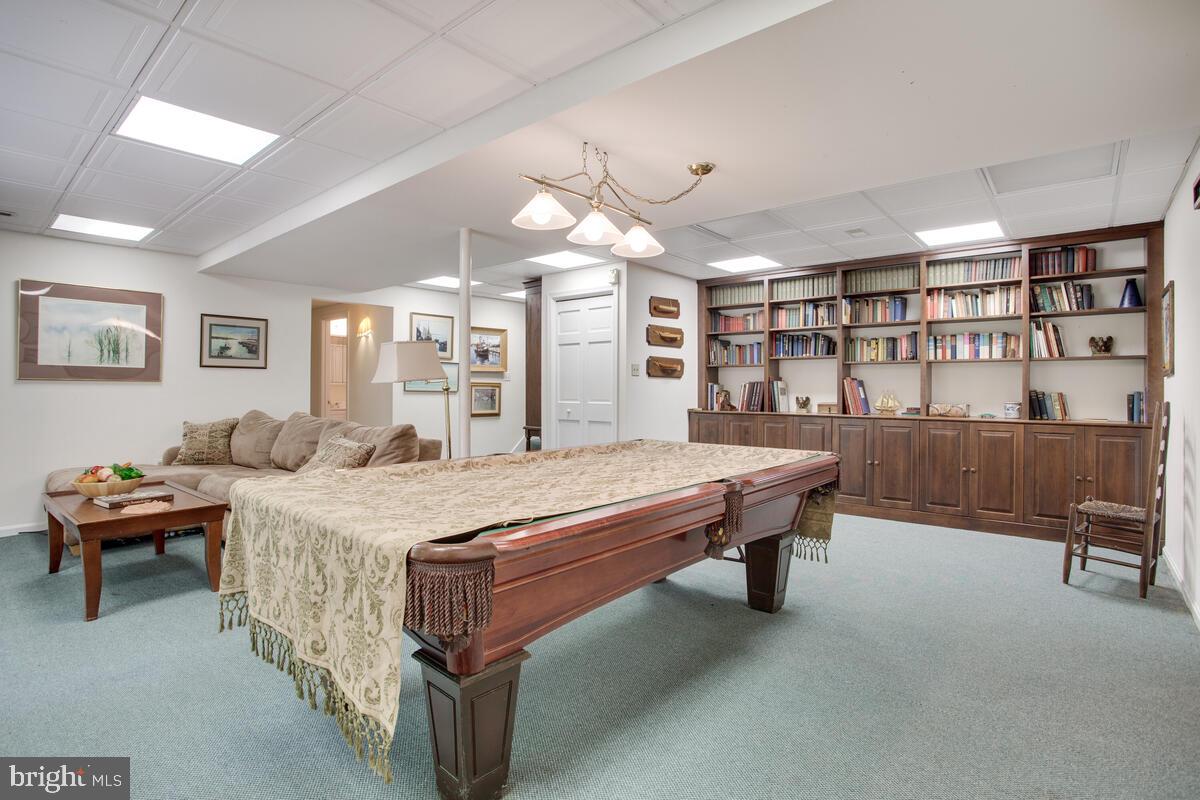 5025 Kings Road St. Leonard, MD 20685 - Photo 36 of 62 Lower level Rec Room with built ins