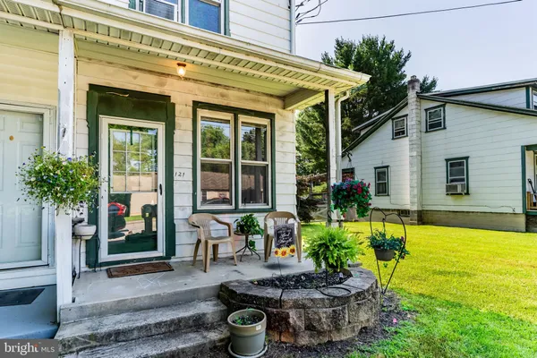 a front view of a house with swimming pool