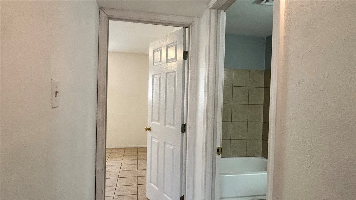 1004 Austin Street, Unit 9 Portland, TX 78374 - Photo 12 of 22 Hall to two bedrooms and bathroom