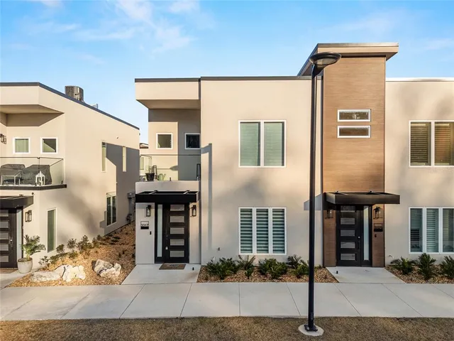 a front view of a building with street view