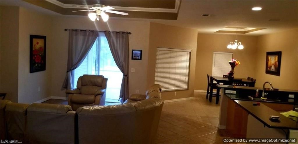 2983 Point Street North Port, FL 34286 - Photo 6 of 19 a dining room with furniture and window