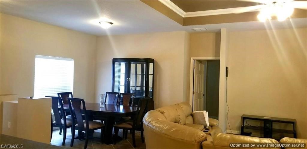 2983 Point Street North Port, FL 34286 - Photo 8 of 19 a view of a dining room with furniture