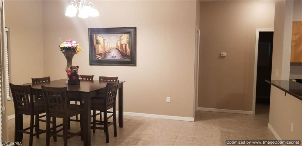 2983 Point Street North Port, FL 34286 - Photo 9 of 19 a view of a dining room with furniture