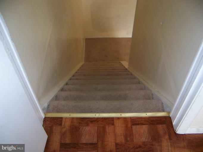 14550 Farmcrest Place Silver Spring, MD 20905 - Photo 15 of 25 Stairs to upper level