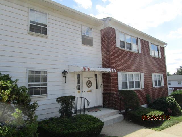 50 Greenhouse Road, Unit 49B Bridgeport, CT 06606 - Photo 1 of 1 a front view of a house with garden