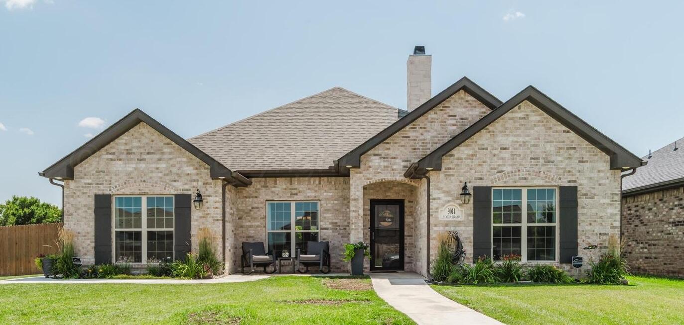 9011 Staten Island Amarillo, TX 79119 - Photo 1 of 17 front view of a house with a yard